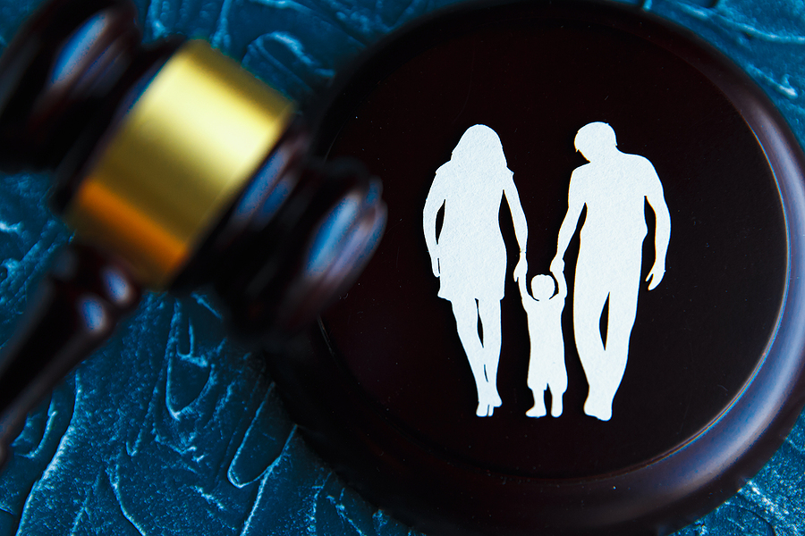 An image of a family and a gavel. Family Law Concept